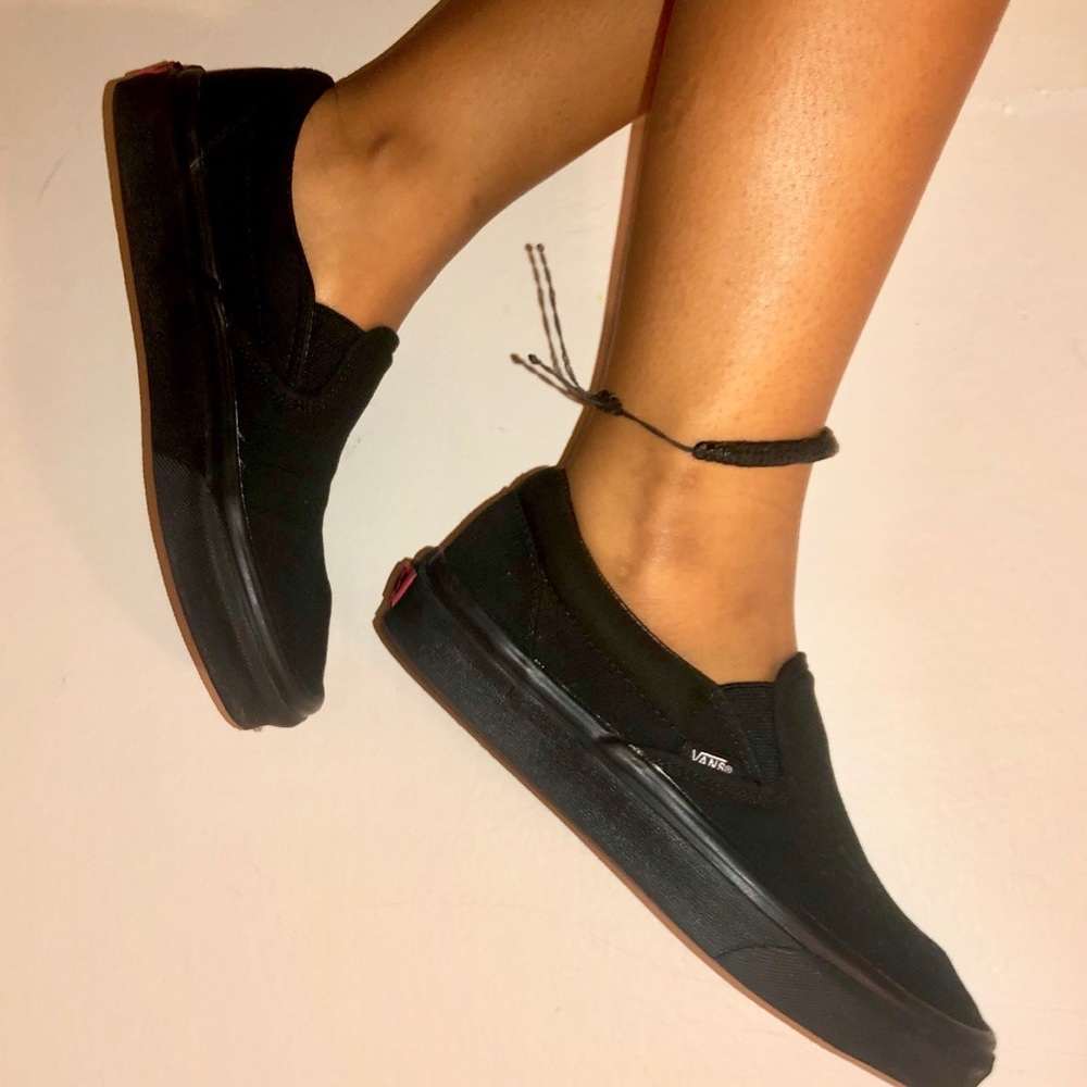 Woman’s All Black Slip-on Vans